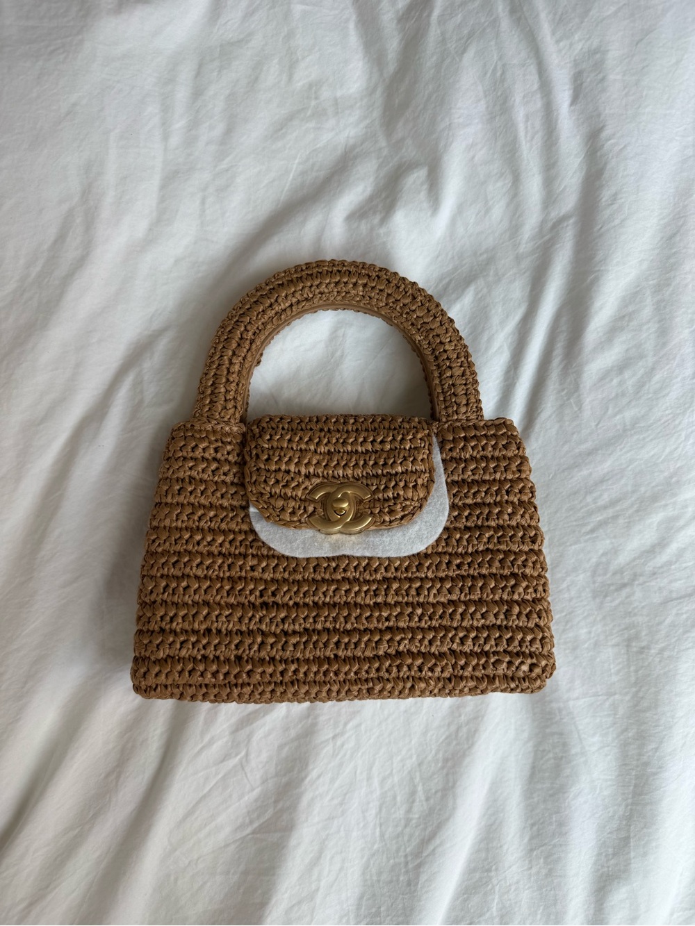 CHANEL Kelly raffia top-handle bag